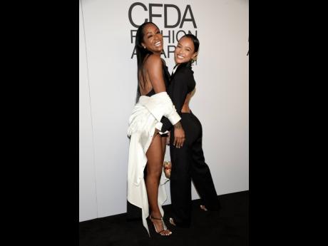 Latoia Fitzgerald (left) and Karrueche Tran wore Fitzgerald’s Lionne Clothing.