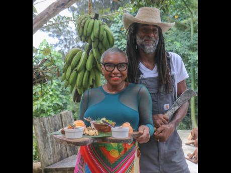 Lisa (left) and Christopher Binns, owners of Stush in the Bush, pause for a quick photograph during a Jamaica Tourist Board destination update-media trip tour and lunch at Stush in the Bush in St Ann.
