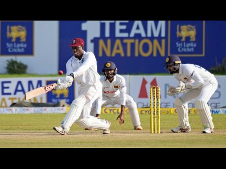 West Indies' batsmen Nkrumah Bonner plays a shot during the day two of their first Test cricket match against Sri Lanka in Galle, Sri Lanka, today.