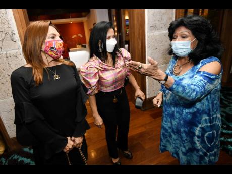 Consul of Ecuador Clelia Barreto de Hunter (right) is caught in conversation with Ambassador Gina Gillen of Costa Rica and Chile’s Ambassador to Jamaica, Constanza Figueroa Sepúlveda (centre). 