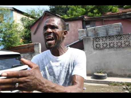 Credit: Rudolph Brown/Photographer Roger Simpson speaks to journalists about the killing of his son, Shavon Simpson, at an illegal bike show on Monday.