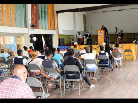 Credit: Stephanie Lyew Cleve ‘Lt Stitchie’ Laing addresses the parents, students and staff during the handover ceremony.