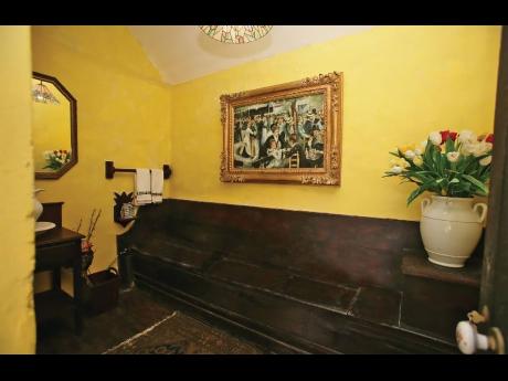 A three-seater commode that family members used at the same time to ease themselves whenever the urge took them.