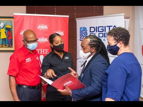 From left: Vincent Auld, senior SME Resource Centre officer, JMMB; Shani Duncan-Falconer, senior corporate manager, SME Resource Centre, JMMB; Kemal Brown, president and chief executive officer, DGM; and Thasya Chin-Fletcher, chief enabler, DGM at the Digi