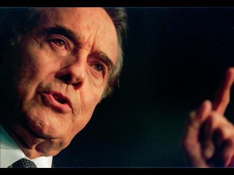 Presidential hopeful Senator Bob Dole speaks to supporters in LeMars, Iowa, on February 10, 1996. Dole died on Sunday aged 98. 