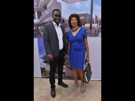 Ike Johnson, co-founder, executive vice-president and chief operating officer, Sygnus Group, and Diane Edwards, president of the Jamaica Promotions Corporation, at the ceremonial groundbreaking of One Belmont on Tuesday.