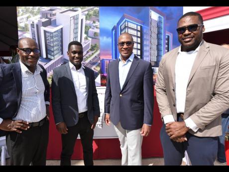 Sygnus men (from left) Berisford Grey, co-founder, president and chief executive officer, Sygnus Group; Ike Johnson, executive vice-president and chief operating officer, Sygnus Group; David Cummings, vice-president and head of real estate and project fina