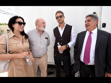 We snapped (from left) RE/MAX realtor Anya Kerr-Jarrett; Mark Kerr-Jarrett, managing director of Barnett Limited; Randy Cheeks, attorney at law at Levy Cheeks; and businessman Gasan Azan in conversation at the One Blemont groundbreaking.