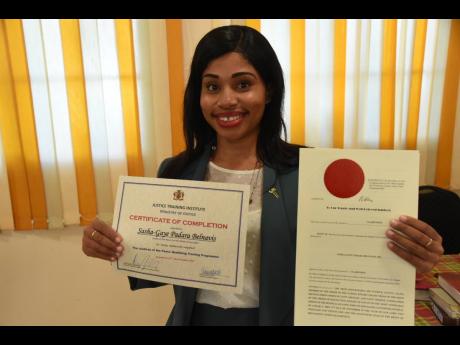 Sasha-Gaye Padara Belnavis, the youngest justice of the peace in the batch of 37 sworn in on Wednesday.