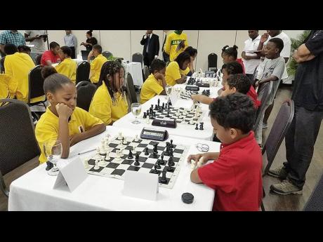 A rapid team chess match during the Jamaica International Chess Festival held last summer.