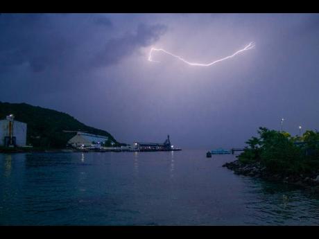 
A streak of lightning across the night skies – photo taken at Magaritaville, Ocho Rios