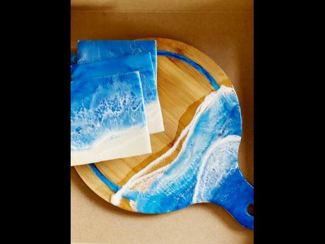 
Resin coasters and cutting board by ACreativHaus.