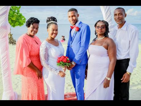Credit: Contributed The lovely newlyweds are joined by their parents (from left): mother of the bride, Lenora Lewis, mother of the groom Charmaine Jones and father of the groom, Dave McFarlane.