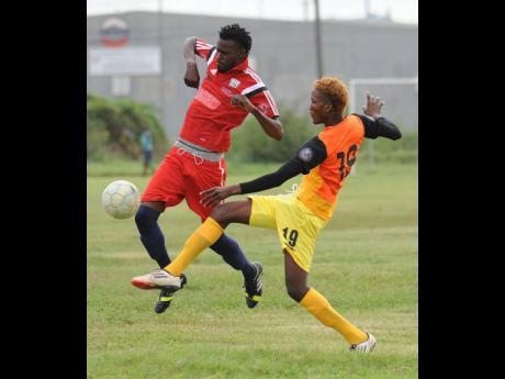 Action from a previous edition of the Kingston and St Andrew Football Association Super League.