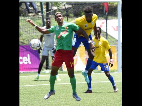Andre Clennon (left) of Humble Lion and Harbour View’s Ajeanie Talbott in a battle for possession during a Jamaica Premier League match at the UWI/Captain Horace Burrell Centre of Excellence on August 15. 