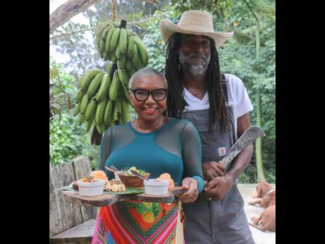 Lisa and Christopher Binns, owners of Stush in the Bush, pause for a quick photograph during a Jamaica Tourist Board destination update-media tour and lunch at Stush in the Bush in St Ann.