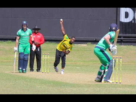 Jamaica Scorpions fast bowler Nicholson Gordon in full flight against Ireland in their 50-over warm-up match at Sabina Park. Gordon ended with figures of 5-34 as the Scorpions won by five wickets.