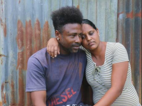 Credit: Ashley Anguin Jeffery Barron and his wife Rozanna at their temporary home in Dumphries, Trelawny.