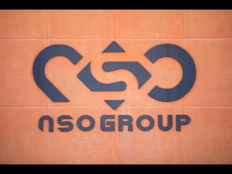 
A logo adorns a wall on a branch of the Israeli NSO Group company, near the southern Israeli town of Sapir, August 24, 2021. Israeli lawmakers on Tuesday, January 18, 2022, called for a parliamentary inquiry into the police’s alleged use of sophisticate