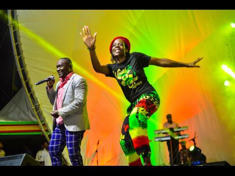Minister Lubert Levy (left) with spiritual dancer Hattie at Gospel Night at Reggae Wednesdays, held at Emancipation Park in New Kingston on Ash Wednesday evening, February 26, 2020. 