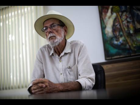 Mayor Jose Bonifacio listens during an interview in his City Hall office of  Cabo Frio, Brazil, on December 15, 2021.