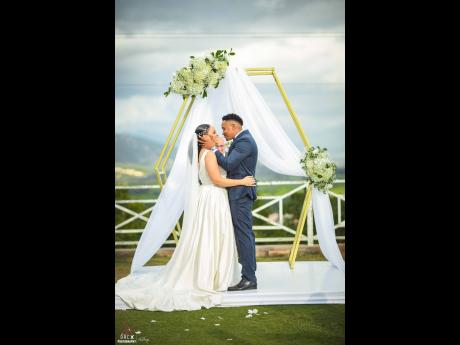 With the directive to now kiss his bride, Arillon does just that, sealing their nuptial ceremony.