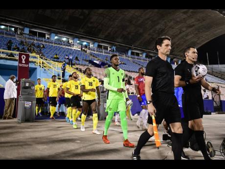 Credit: Gladstone Taylor Teams and officials enter the field for the Jamaica versus Costa Rica Concacaf World Cup qualifier held at the National Stadium in St Andrew on Wednesday, February 2, 2022.