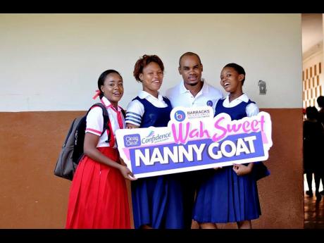 Dunoon Park Technical High students pose for a memorable frame with Fabian Barracks and actress Crystal Fletcher (left) on the promotional trail of ‘Wah Sweet Nanny Goat’ 2016.