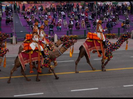 Indian Border Security Force soldiers on camels parade through the ceremonial Rajpath boulevard during Republic Day celebrations in New Delhi, India, January 26. The day marks the anniversary of the adoption of the country’s constitution in 1950. 