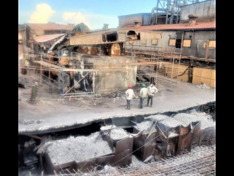 This photo taken in November 2021 shows the old 13.8 KV Room in the Jamalco powerhouse, the damaged electrical cabinets and demolished turbine, resulting from a fire at the facility on August 22, 2021.