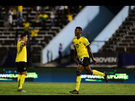Jamaica’s Damion Lowe celebrates what would have been Jamaica’s second goal, if not for a foul, in a Concacaf World Cup qualifier against the United States at the National Stadium in Kingston on Tuesday, November 16, 2021. The game ended 1-1.