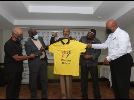 From left: Christopher Samuda, president, Jamaica Olympic Association, Denzil Wilks, general manager, Sports Development Foundation, Ray Harvey, Chairman, Western Relays, Chester McCarthy, Athletic Director, GC Foster, and Brian Smith, Assistant Secretary,