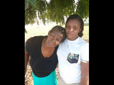 Jennifer Porter being comforted by her granddaughter, Samantha McIntosh, as they grieve the shooting death of Dain Wedderburn, who was reportedly fatally shot by a cop on Tuesday in Amity, Westmoreland. The 69-year-old woman, who claimed that she witnessed
