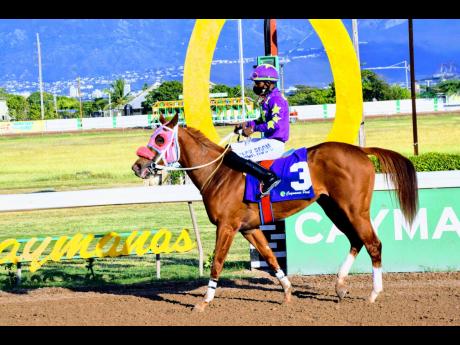Credit: Anthony Minott CAROL STRIKE with Tevin Foster aboard after winning the eighth race at Caymanas Park on Saturday, January 15, 2022.