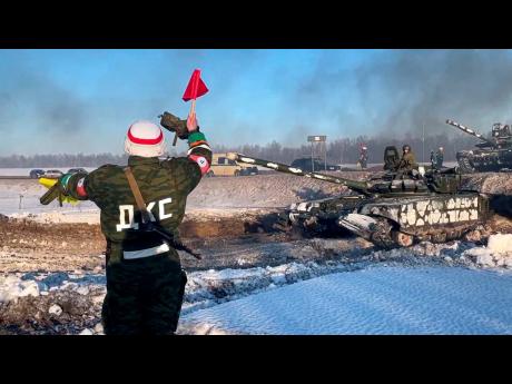 Russian army tanks move back to their permanent base after drills in Russia. In what could be another sign that the Kremlin would like to lower the temperature, Russia’s Defence Ministry announced Tuesday that some units participating in military exercis