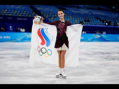 Credit: AP Gold medallist, Anna Shcherbakova, of the Russian Olympic Committee, poses during a venue ceremony after the women's free skate programme during the figure skating competition at the 2022 Winter Olympics, Thursday, February 17, 2022, in Beijing.