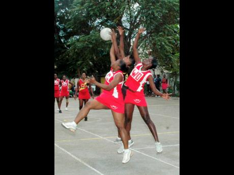 
This file photo shows Pacers A’s Dahlia Rickettes (left) and Denise Brown (right), out-muscling an Angels ‘B’ player during a St James Goodwill Open Netball League game all the way back in 2011.
