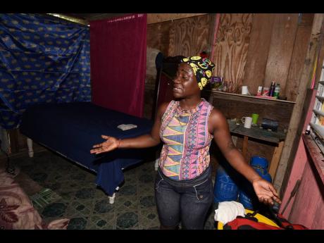 Twenty-seven-year-old Shadesha Gordon from Dunbeholden in St Catherine is asking the public for help. She currently lives in a small one-bedroom board house without a bathroom or kitchen with her two children.