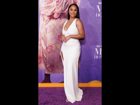 Geneva Maccarone stuns in white on the purple carpet. 