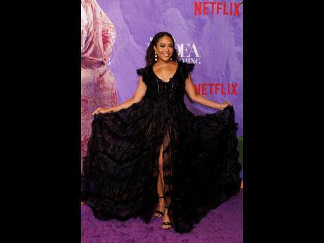 Candace Maxwell, who plays the role of Ellie in ‘Tyler Perry’s A Madea Homecoming’, wore a black fringe Maddie dress by RC Caylan Atelier. She was styled by Crystal Truong, with jewellery by Mahrukh Akuly and make-up by Ana’s Makeup Artistry. 