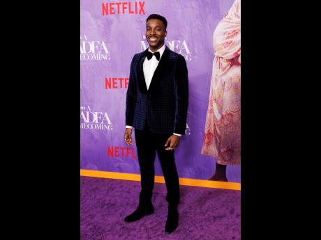 Brandon Black chose a velvet suit for the occasion. 
