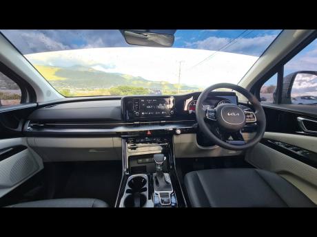 Credit: Kareem LaTouche The interior is crammed with features such as dual climate control and multiple USB ports for transferring data and charging.