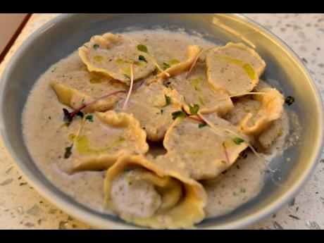 Fresh tortellini stuffed with wilted mushrooms, ricotta cheese, and roasted chicken tossed in a burnt mushroom sauce.