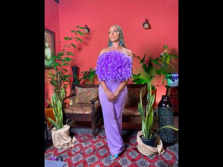Fashion designer Kadian Nicely created Nadine Sutherland’s lavender ensemble which stood out with a tube top made from  feather boas. 