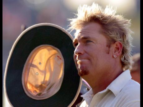  Australia’s Shane Warne leaves the field after taking five wickets at the end of the first day of the fifth Test between England and Australia at the Oval in London, Thursday September 8, 2005. 