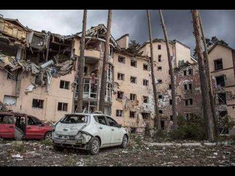 An apartment building damaged following a shelling on the town of Irpin, 26 kilometres west of Kyiv.