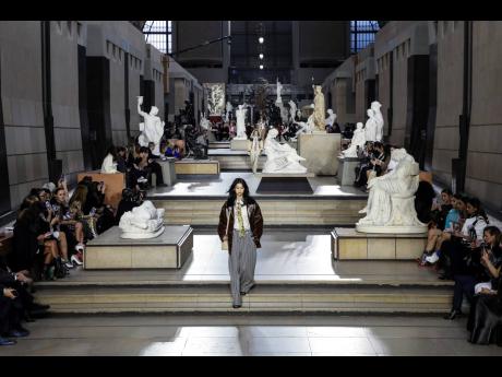 HoYeon Jung wears a creation as part of the Louis Vuitton Ready To Wear Fall/Winter 2022-2023 fashion collection, unveiled during the Fashion Week in Paris.
