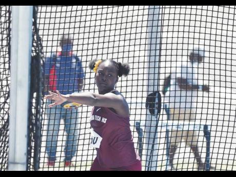 Credit: Kenyon Hemans Holmwood Technical High School’s Cedricka Williams gets ready to unleash the discus during the JAAA Carifta Trials at the National Stadium last weekend.
