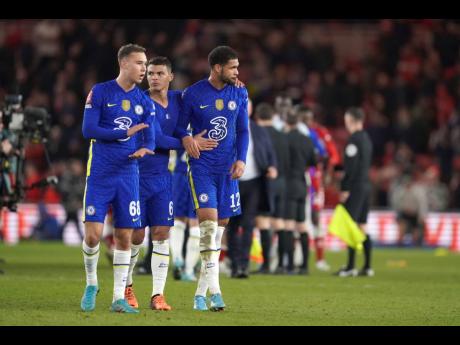 Chelsea players celebrate at the end of the English FA Cup quarter-final match against Middlesbrough at the Riverside Stadium in Middlesbrough, England, on Saturday, March 19. Chelsea won 2-0.