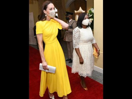 The Duchess of Cambridge is escorted by Lady Allen, the wife of Governor General Sir Patrick Allen, during a courtesy call at King’s House. 